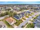 Aerial view of neighborhood with houses and streets at 16792 Meadows St, Clermont, FL 34714
