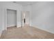 Bedroom with neutral walls, carpet, and a large closet at 16792 Meadows St, Clermont, FL 34714