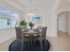 Round dining table with four chairs in a bright space at 16792 Meadows St, Clermont, FL 34714