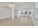 Dining area with tile flooring and neutral color palette at 16792 Meadows St, Clermont, FL 34714