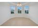 Bright dining room with bay window and tile floor at 16792 Meadows St, Clermont, FL 34714
