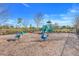 playground with slides and spring riders at 16792 Meadows St, Clermont, FL 34714