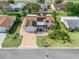 Aerial view of single-Gathering home with solar panels and landscaped yard at 17744 Se 95Th Ct, Summerfield, FL 34491