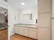 Clean bathroom with granite countertop and built-in cabinets at 17744 Se 95Th Ct, Summerfield, FL 34491