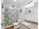 Bathroom with shower/tub combo, granite countertop, and tiled walls at 17744 Se 95Th Ct, Summerfield, FL 34491