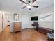 Spacious bedroom with hardwood floors and ample closet space at 17744 Se 95Th Ct, Summerfield, FL 34491