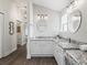 Elegant bathroom with granite countertops and dual sinks at 17880 Se 86Th Oak Leaf Ter, The Villages, FL 32162