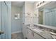 Bathroom with granite vanity and updated fixtures at 2001 Cristo Rd, Lady Lake, FL 32159