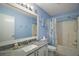 Clean bathroom with granite vanity and bathtub at 2001 Cristo Rd, Lady Lake, FL 32159