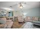 Bright living room with comfy seating and coastal decor at 2001 Cristo Rd, Lady Lake, FL 32159