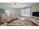 Living room with comfy seating and large window at 2001 Cristo Rd, Lady Lake, FL 32159