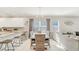 Dining area with a wood table and light teal chairs at 2029 Sloans Outlook Dr, Groveland, FL 34736