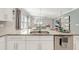 Modern kitchen with island and stainless steel appliances at 2029 Sloans Outlook Dr, Groveland, FL 34736