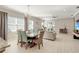 Living room with sectional sofa and sliding glass doors at 2029 Sloans Outlook Dr, Groveland, FL 34736