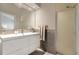 Modern bathroom with floating vanity, gray tile, and walk-in shower at 21837 Royal St Georges Ln, Leesburg, FL 34748