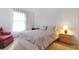 Charming bedroom with a double bed and bedside table at 21837 Royal St Georges Ln, Leesburg, FL 34748