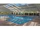 Indoor heated swimming pool with skylights at 21837 Royal St Georges Ln, Leesburg, FL 34748