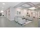 Community clubhouse lobby with seating area at 21837 Royal St Georges Ln, Leesburg, FL 34748