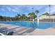 Outdoor swimming pool with lounge chairs at 21837 Royal St Georges Ln, Leesburg, FL 34748