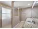 Well-lit bathroom features granite counters with dual sinks, tiled floor and spacious walk-in shower at 3380 Cr 528, Sumterville, FL 33585