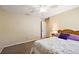 Bedroom featuring a closet, ceiling fan, and neutral carpeting at 3380 Cr 528, Sumterville, FL 33585