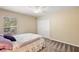 Bedroom featuring a closet, window, and ceiling fan at 3380 Cr 528, Sumterville, FL 33585