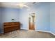 Bonus room featuring a ceiling fan, piano, and doorway to other rooms at 3380 Cr 528, Sumterville, FL 33585