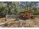 Chicken coop and pen with a charming painted rooster design at 3380 Cr 528, Sumterville, FL 33585