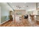 Open-concept living area with tile floors, neutral tones, and lots of natural light at 3380 Cr 528, Sumterville, FL 33585