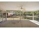 Spacious screened-in patio offering a seamless transition to the outdoors at 3380 Cr 528, Sumterville, FL 33585