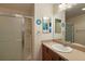 Clean bathroom with a shower and a single sink vanity at 3764 Ivey Ter, The Villages, FL 32163