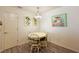Charming dining area with a round table and four chairs at 3764 Ivey Ter, The Villages, FL 32163