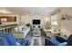 Spacious living room with comfortable seating and a TV at 3764 Ivey Ter, The Villages, FL 32163