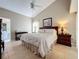 Spacious main bedroom with ensuite bathroom access at 3916 Doune Way, Clermont, FL 34711