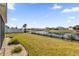 Spacious backyard with pond view and privacy fence at 4250 Cassandra Ct, Wildwood, FL 34785