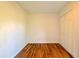 This bedroom features hardwood floors and a closet at 4668 Tower Pine Rd # Ge, Orlando, FL 32839