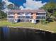 Two-story building with lakefront views at 4668 Tower Pine Rd # Ge, Orlando, FL 32839
