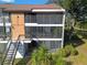 Two-story building with screened balconies at 4668 Tower Pine Rd # Ge, Orlando, FL 32839