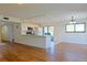 Open concept kitchen with island and view to backyard at 4668 Tower Pine Rd # Ge, Orlando, FL 32839