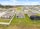 Aerial view of houses, roads and landscape at 4861 Panga Ave, Mount Dora, FL 32757