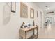 Entryway with console table, decorative items, and mirrors at 4861 Panga Ave, Mount Dora, FL 32757