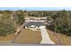 Aerial view of house, driveway, and lot at 51 Aspen Rd, Ocala, FL 34480