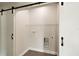 Laundry closet with shelving and a utility sink at 51 Aspen Rd, Ocala, FL 34480