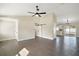 Open floor plan living room with sliding barn doors at 51 Aspen Rd, Ocala, FL 34480