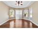 Bright dining room with hardwood floors and sliding glass doors at 6027 Spinnaker Loop, Lady Lake, FL 32159