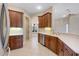 Kitchen with stainless steel appliances and wood cabinets at 6027 Spinnaker Loop, Lady Lake, FL 32159