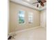 Bright office with tile floors and two windows at 6027 Spinnaker Loop, Lady Lake, FL 32159