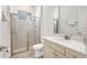 Clean bathroom with a shower, toilet, and vanity at 8059 Knee Deep Rd, Kissimmee, FL 34747