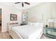 Main bedroom with a king-size bed and nightstands at 8059 Knee Deep Rd, Kissimmee, FL 34747