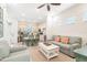 Open concept living and dining area with an adjacent kitchen at 8059 Knee Deep Rd, Kissimmee, FL 34747